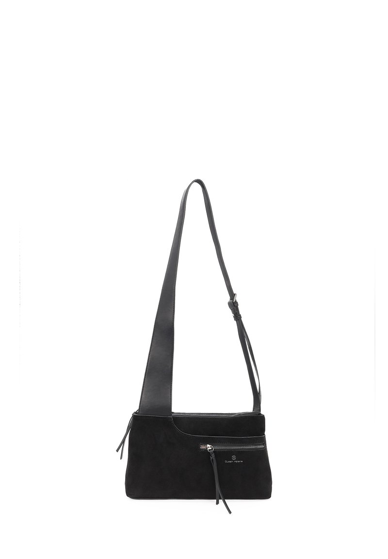 Borsa nera in pelle liscia e suede. Un dettaglio notevole è la tracolla rimovibile e la tasca con zip frontale.