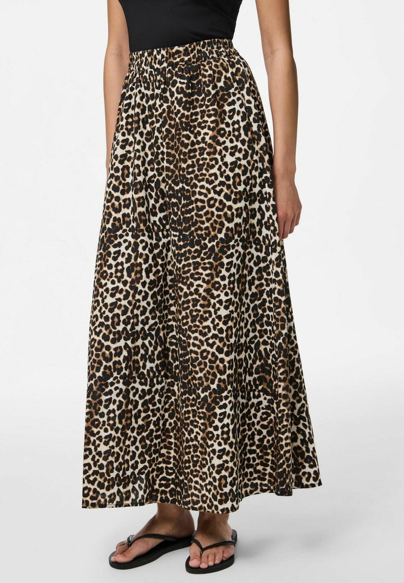 Maxi svārki ar dzīvnieku rakstu, kas iezīmējas ar brūnu un melnu leopardu rakstu, elastīgu jostu, plūstošu dizainu, izgatavoti no viegla auduma.
