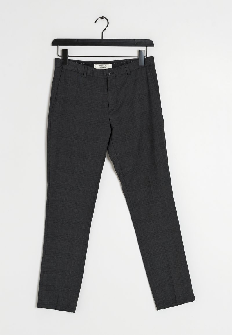 Pantalons cintrés gris foncé avec un motif à carreaux subtil, un devant plat et une coupe slim. Le tissu a une texture lisse. Comprend des passants de ceinture.