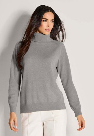 Grijze coltrui van zachte brei met lange mouwen en ribgebreide manchetten. Gladde textuur, relaxte pasvorm en lichte drop shoulder detail.