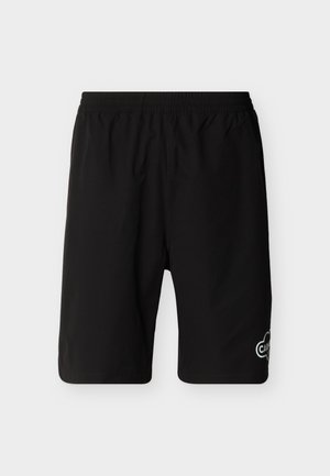 Mustad põlveni ulatuvad lühikesed püksid elastse vöökohaga ja väike valge logo parema jala ääres, esitletud tavalise taustaga.