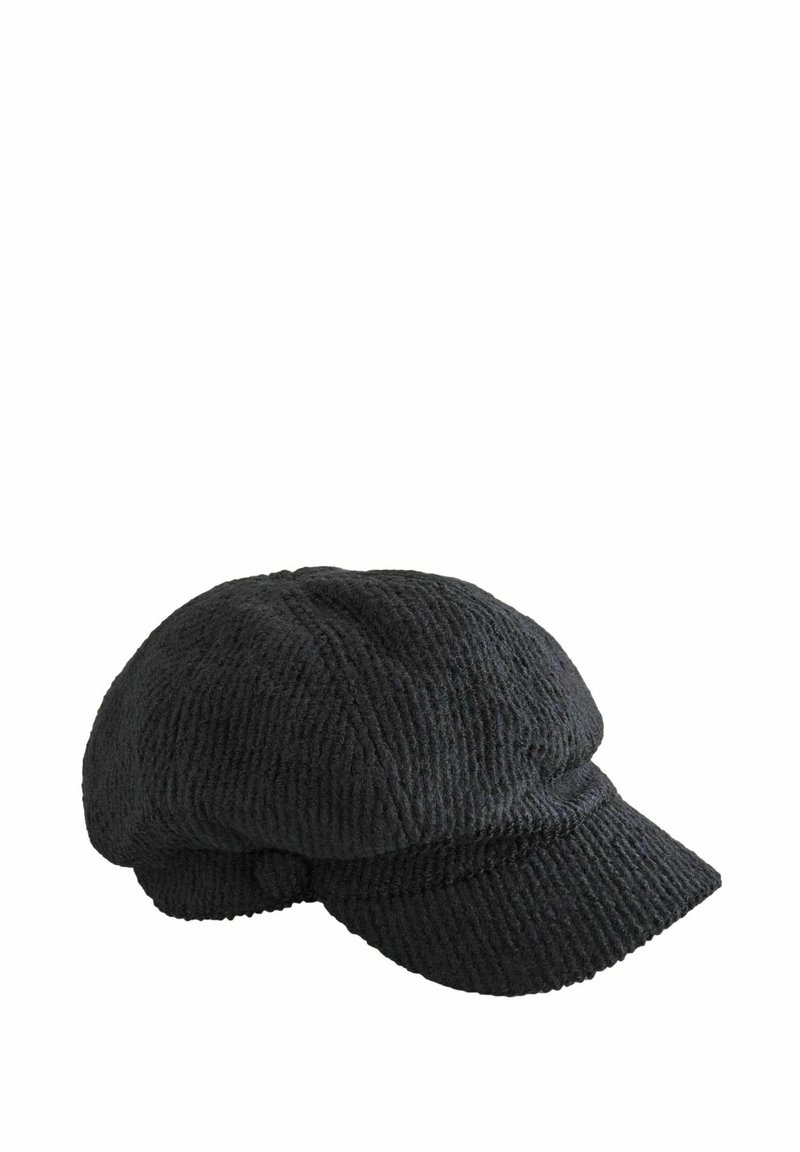 Zwarte corduroy newsboy cap met een gestructureerde stof en een korte, gebogen rand.