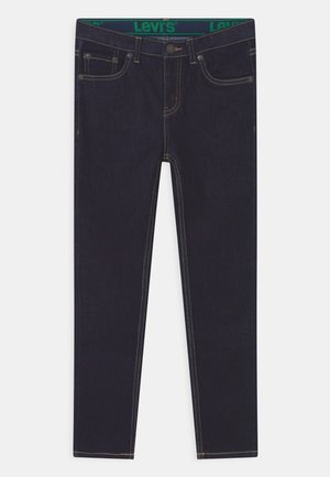 Dark blue Levi's jeans with a green waistband and classic five-pocket design. The fabric has visible stitching details.