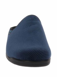 Scarpa slip-on blu navy con texture a costine, punta arrotondata e suola in gomma nera. Design minimalista, senza hardware o accenti visibili.