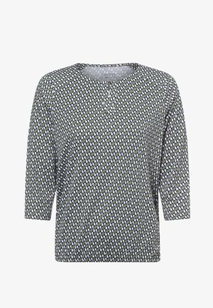Grün-weiß gemusterte Bluse mit rundem Ausschnitt und dreiviertellangen Ärmeln. Aus leichtem Material mit strukturierter Oberfläche.