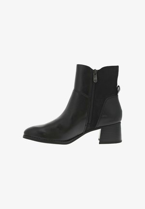 Botte en cuir noire à la cheville avec une fermeture éclair latérale, bout rond et un talon carré texturé. Fini lisse avec des coutures minimalistes.