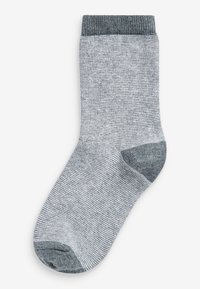 Grå och ljusgrå mönstrad strumpa med en ribbad mörkgrå manschett. Tillverkad av stickat material med en sömlös tådesign.