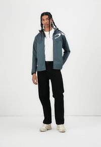 Oakley ENHANCE TECH JACKET - Summer jacket - dark slate