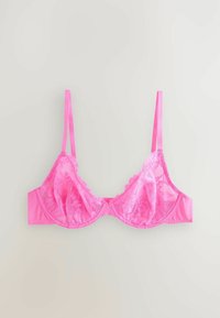 Roze kanten bralette met verstelbare bandjes. Gestructureerde bloemenkant bekers en een gladde band. Golvende randen voegen detail toe aan het ontwerp.