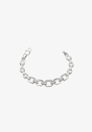 Ezüst lánc karkötő, amely egymásba kapcsolt téglalap és ovális láncszemekből áll, középen három kubikus zirkónia díszítéssel. Polírozott felület.