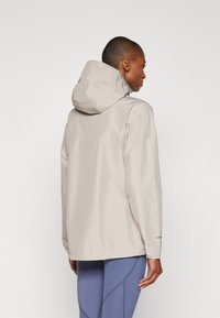 Berghaus DELUGE PRO JACKET - Regnjakke - taupe