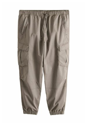 Light brown cargo pants with elastic waistband, drawstring, multiple pockets, and elastic cuffs at the ankles.