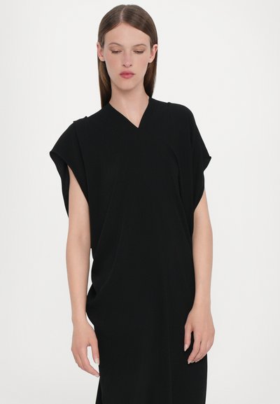 Black V-neck dress made of smooth, lightweight fabric with wide sleeves and a relaxed silhouette. Minimalist design with no patterns or accents.