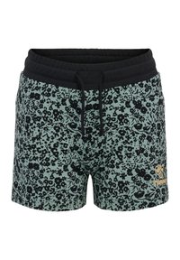 Blommönstrade shorts i grönt med svarta blommor. Har en svart elastisk midja och dragsko, samt en guldlogotyp som accent.