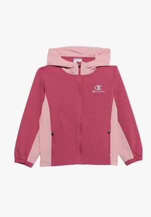Veste à capuche zippée rose et rose foncé avec des poignets élastiques et deux poches avant zippées, avec le logo Champion sur la poitrine.