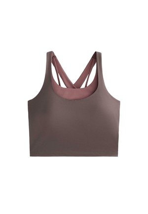 Brown sports bra with a scoop neckline and crisscross straps in a lighter shade. Made of smooth, stretchable fabric; no visible hardware.