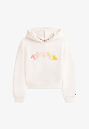 Hanorac scurt de culoarea crem, cu textură moale și cu logo-ul "TOMMY" în culori pastel pe partea din față. Mânșete și tiv cu reiat.