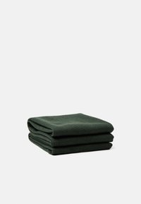 Dark green folded blanket with a soft, textured surface. The material appears woven with subtle patterns. Three layers stacked.