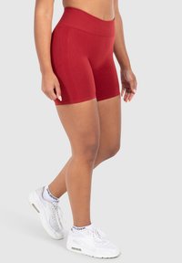 Smilodox CETRINA SEAMLESS SCRUNCH  - Shorts - dunkel rot
