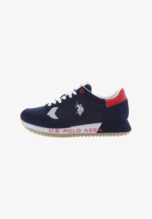 Merenneidon siniset tennarit, joissa on nahan ja verkon yläosa, valkoiset nauhat, punaiset yksityiskohdat sekä "U.S. POLO ASSN." -logo sivuilla ja kantapäällä. Kumipohja.