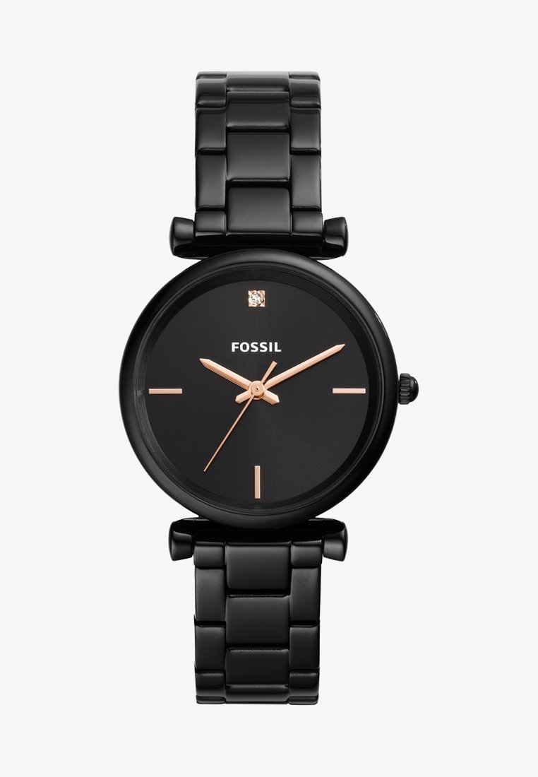 Montre-bracelet noire Fossil avec aiguilles des heures, des minutes et des secondes en or rose, des index minimalistes et un seul diamant à la position 12 heures.