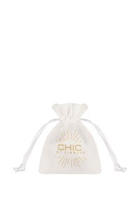 White drawstring bag made of soft fabric, featuring gold lettering "CHIC BY LIRETTE" and decorative sunburst pattern.