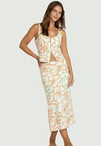 Floral coordinated two-piece set featuring a cropped top and a fitted midi skirt in orange, green, and white, with a smooth cotton texture.