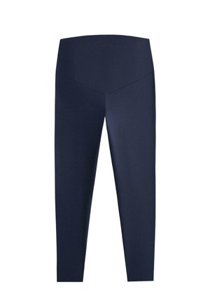 Leggings bleu marine taille haute, longueur intégrale, avec un détail de couture en forme de V à la ceinture avant.