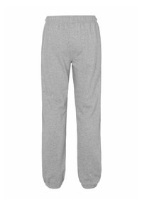 Grijze sweatpants met een elastische tailleband en taps toelopende boorden, gemaakt van zachte katoenen stof, met een gladde textuur en zonder zichtbare patronen.