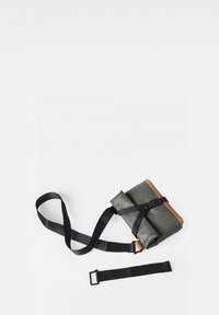 Shoulder bag with a dark green waterproof body, brown leather accents, adjustable black strap, and buckle closure. Includes a removable strap.