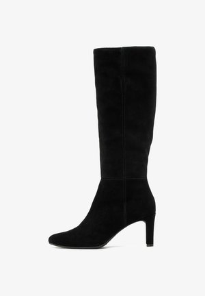 Black suede knee-high boot with a pointed toe and a 5 cm stiletto heel. Smooth texture with minimal stitching detail, elegant silhouette.