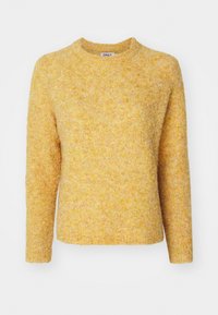 Gul stickad tröja med en strukturerad yta, rund halsringning och långa ärmar. Har en rak fåll och raglanärmar.