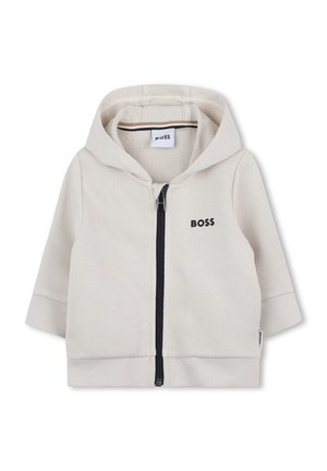 Jasnobeżowa bluza dla malucha z kapturem, czarnym zamkiem błyskawicznym z przodu oraz logo BOSS na lewej piersi.