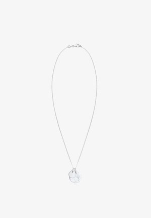 Collier chaîne en argent avec deux pendentifs ronds, l'un lisse et l'autre texturé, sur fond blanc.