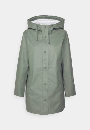 Green waterproof jacket with a hood, snap button closure, side pockets, and a smooth texture. Features adjustable drawstrings at the neck.