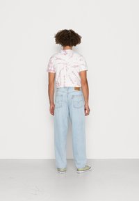 Levi's® STAY BAGGY TAPER - Calças de ganga de corte relaxado - lite euphoria