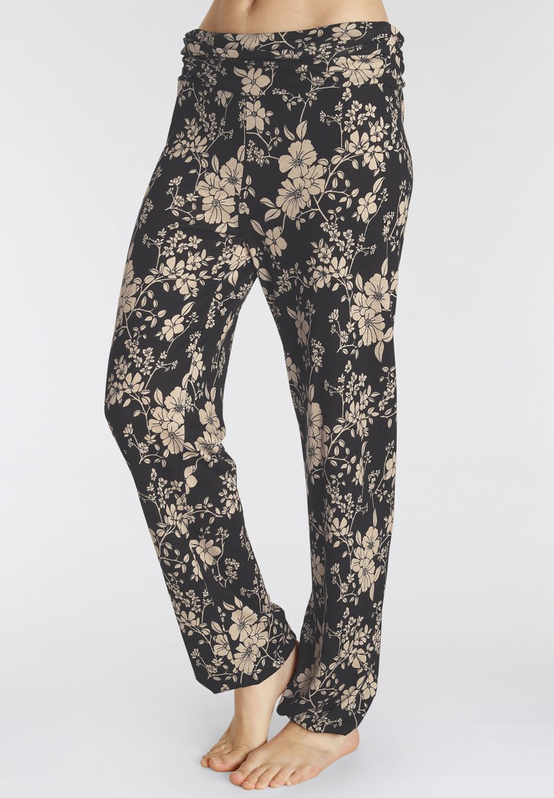 Losse, bloemenprint pyjamabroeken in zwart met beige bloemen, voorzien van een zachte, gestructureerde stof en een brede tailleband voor comfort.
