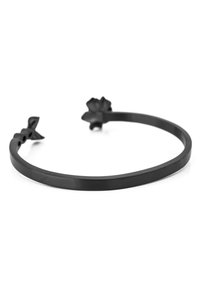 Black metal bracelet featuring a smooth, rounded band with floral accents on both ends. The design is minimalist with a matte finish.
