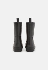 bottes calvin klein caoutchouc