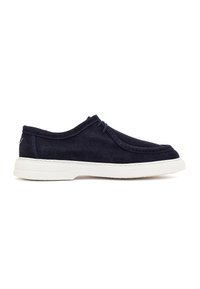 Navy blue suede casual men's shoe with white rubber sole, lace-up front, and moc toe stitching on a plain white background.