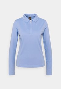 Långärmad polo i ljusblått, tillverkad av texturerad tyg. Har en krage och en halvmåttdragkedja med en liten silverdragsko.