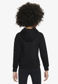 Black hooded sweatshirt made of soft fabric, featuring a kangaroo pocket, ribbed cuffs, and a relaxed fit. Viewed from the back, no logos visible.