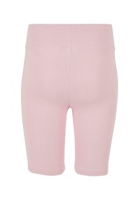 Lys rosa, elastiske sykkelshorts laget av mykt, ribbestrikket stoff. Har høy, elastisk midje og sømløse sider for komfort.