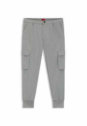 Helle graue, schmal zulaufende Cargo-Hosen mit seitlichen Klappentaschen, Gürtelschlaufen, Vorderknopf- und Reißverschluss und elastischen Knöchelbündchen.