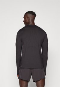 Puma HYROX RUN CLOUDSPUN TEE - Longsleeve - black