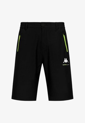 Shorts noirs jusqu’aux genoux avec poches zippées vert fluo, bouton et taille élastique, et logo Kappa blanc avec le texte « VR|46 Racing Team » sur la jambe droite.