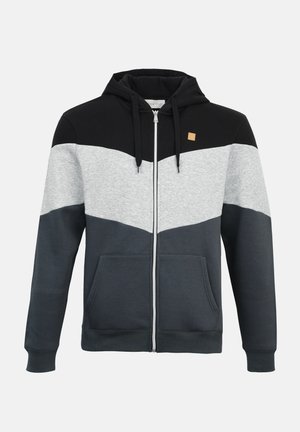 Φούτερ με κουκούλα και φερμουάρ, με πάνελ σε μαύρο, γκρι και σκουρό γκρι, με τετράγωνο λογότυπο και μπροστινές τσέπες. Μαλακή υφή υφάσματος.