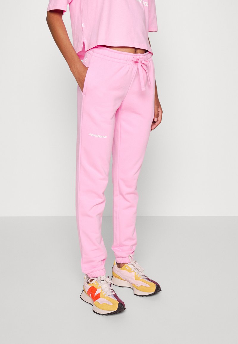 New Balance ESSENTIALS Tracksuit bottoms orbit pink/pink Zalando.ie