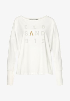 White long-sleeve shirt with a wide neckline, featuring printed letters in light gray and a gold inverted triangle design. Soft material.