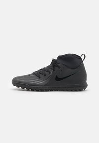 Black athletic shoe with a high ankle design, textured synthetic material, lace-up front, and rubber outsole featuring a patterned grip.